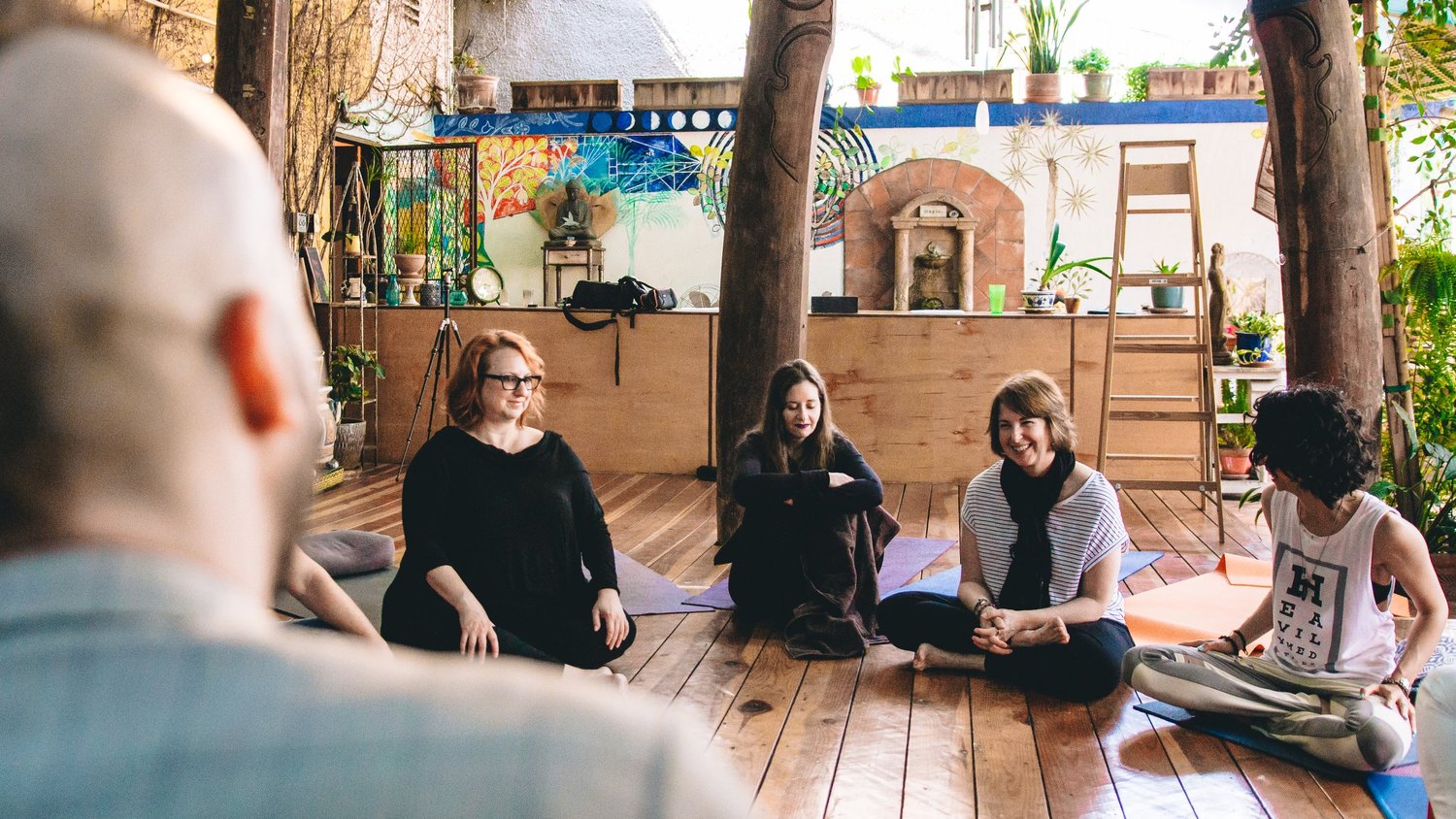 Participants seated in a circle before a Breathwork for Recovery session